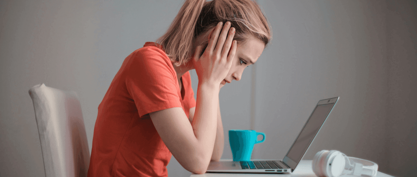 On laptop struggling with their business