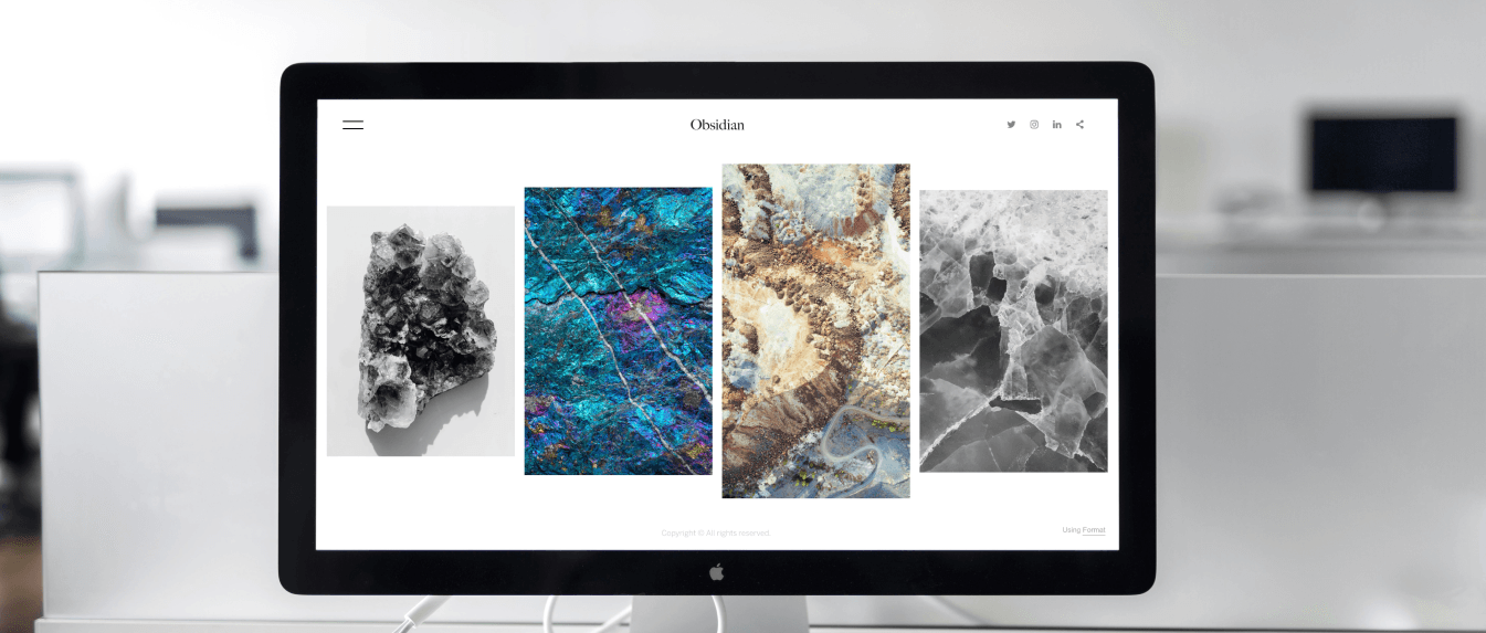 Computer with a Website Design on it